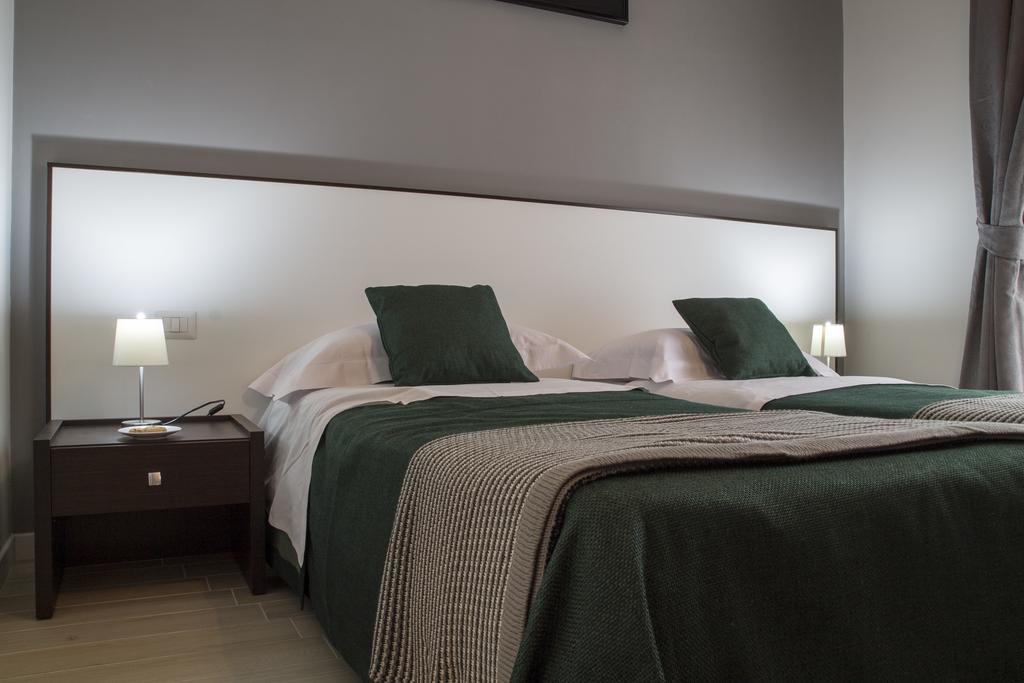 Camera Doppia con Letti Singoli con Letto Supplementare